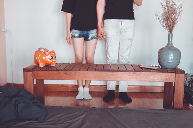 Couple Holding Hands Indoors