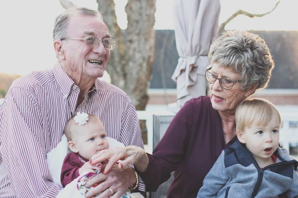 Happy Grandparents with Their Grandchildren