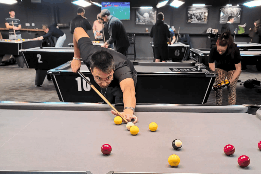 Barney, solicitor at Buss Murton, playing pool